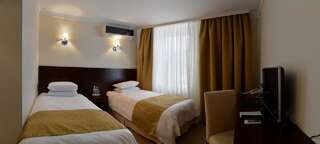 Отель Отель Россия Тирасполь Специальное предложение - Стандартный двухместный номер с 2 отдельными кроватями-1